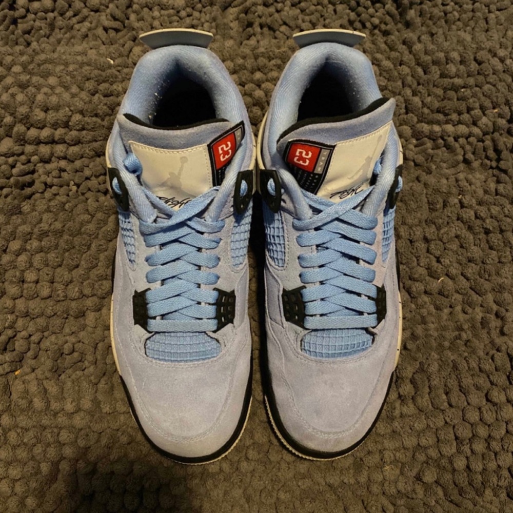 Jordan 4 retro university blue size 5y (6.5 womens) and 5 in mens. NO BOX!